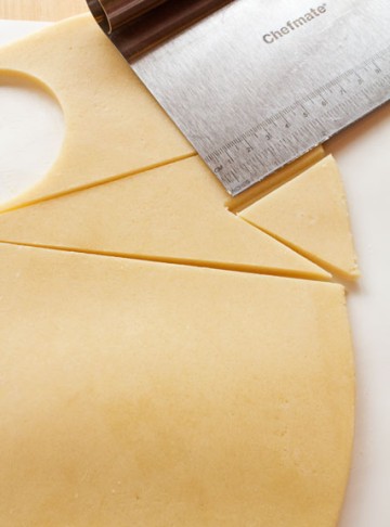 Use a Bench Scraper to cut a nice straight edige for cookies via thebearfootbaker.com