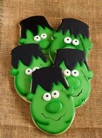 Easy Frankenstein Cookies for Halloween - Sugar cookies decorated with royal icing by thebearfootbaker.com