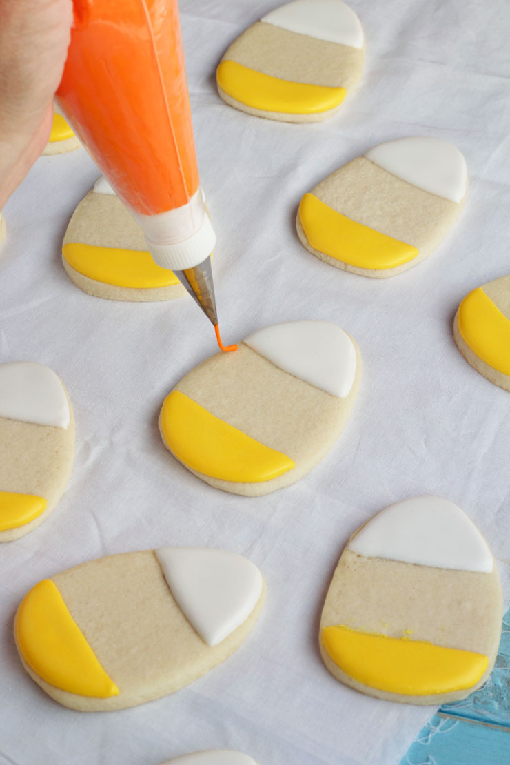 Cute and Simple Candy Corn Cookies by thebearfootbaker.com