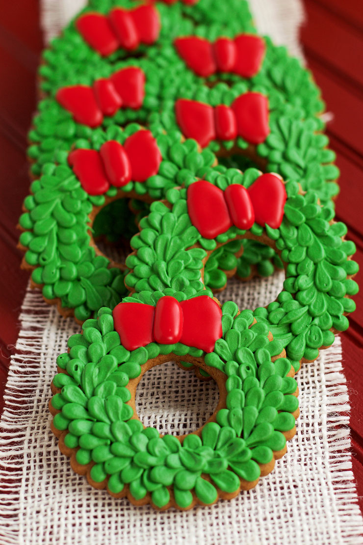 Easy Christmas Wreath Cookies - Sugar Cookies Decorated with Royal Icing thebearfootbaker.com