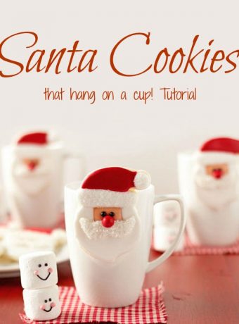 Santa Cookies that hang on a cup Decorated Christmas Cookies via www.thebearfootbaker.com