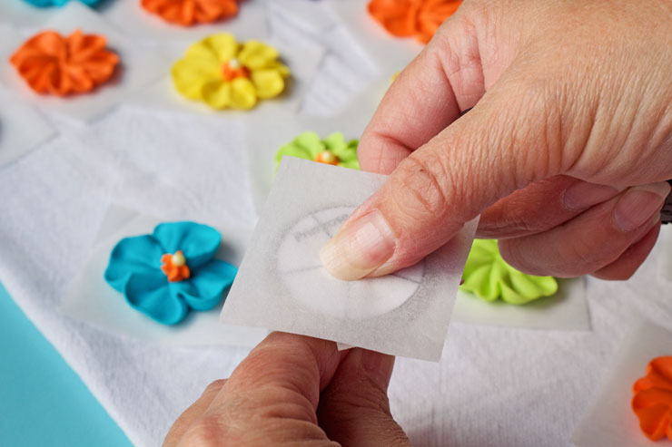 How to Make a Simple Royal Icing Primrose Video by www.thebearfootbaker.com