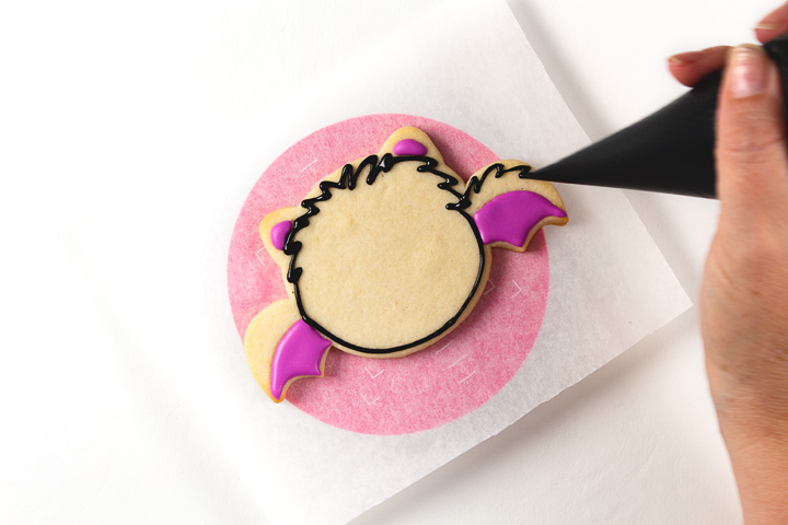 bat sugar cookies decorated with royal icing