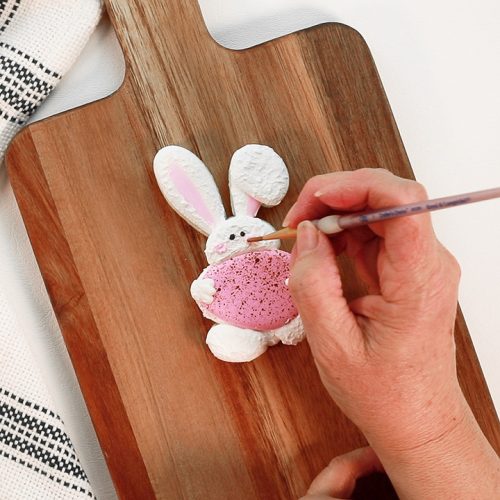 Bunny Holding an egg cookie cutter, bunny bottom cookies, The Bearfoot Baker, sugar cookies, royal icing, Easter Cookies